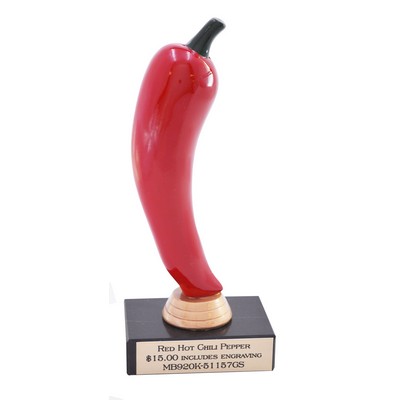 Chili pepper on black marble base